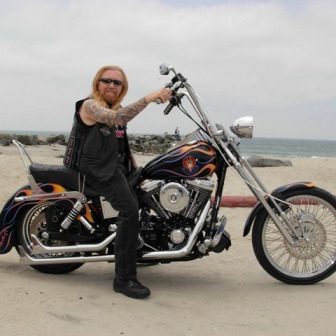 Pastor Z on a motorcycle